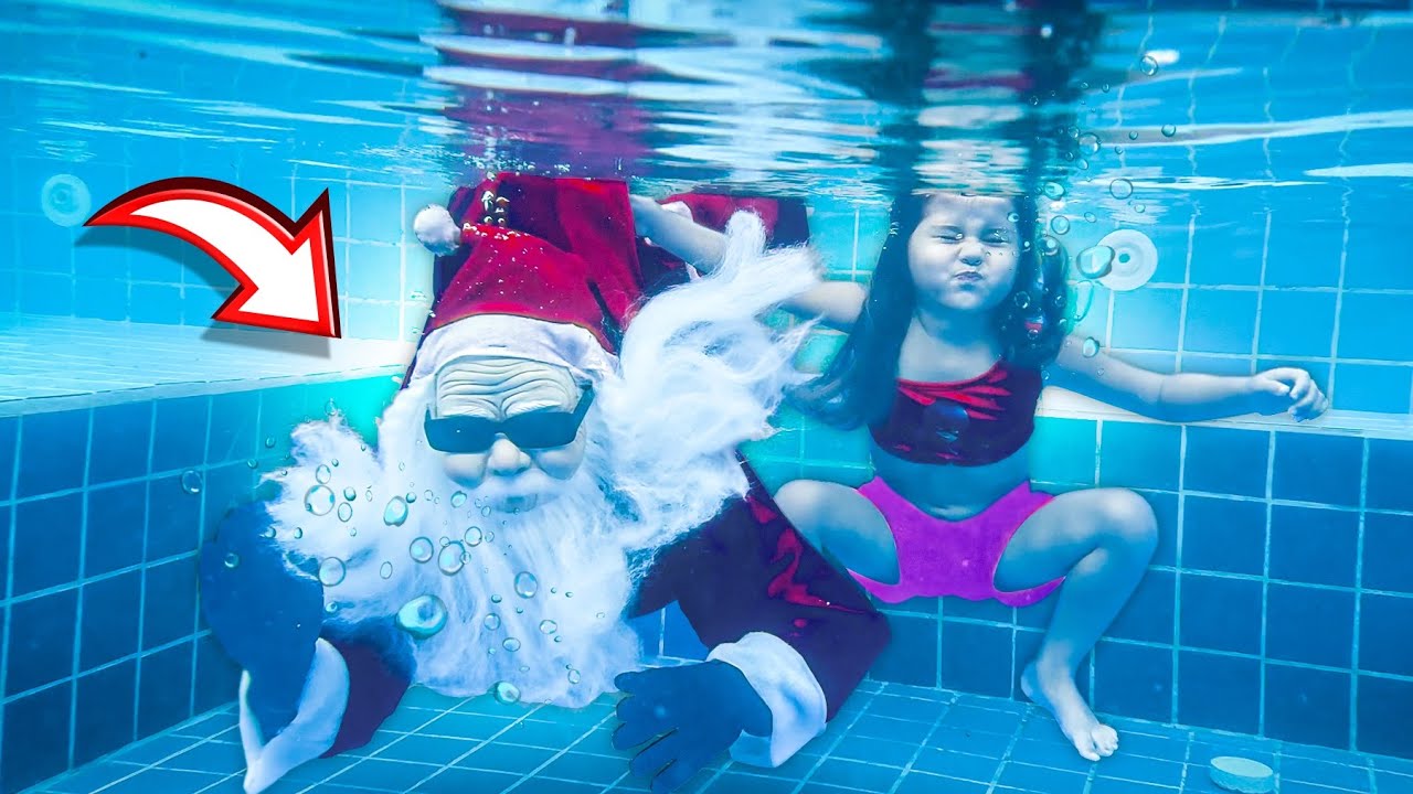 LAYRA MERGULHOU COM O PAPAI NOEL NA PISCINA FUNDA PELA PRIMEIRA VEZ!