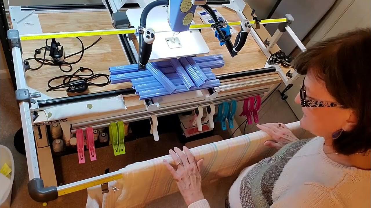 Loading a Quilt on the Cutie™ Frame, Using an Extra Pair of Side Clips