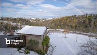 Time lapse of a rainbow and clouds on a snowy landscape, Emilia Romagna, Italy, Europe Time lapse of a rainbow and clouds on a snowy landscape, Emilia Romagna, Italy, Europe