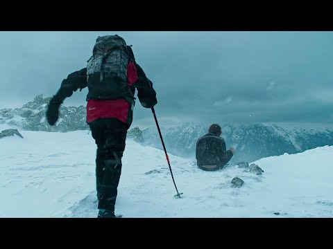 Hiker Finds a Stranded Man Wearing Shorts at The Top of a Snowy Mountain