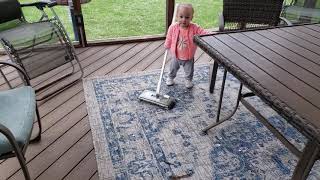 Cleaning up a mess at a young age.