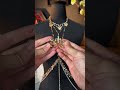 Gold tassel body chain with ornate charm