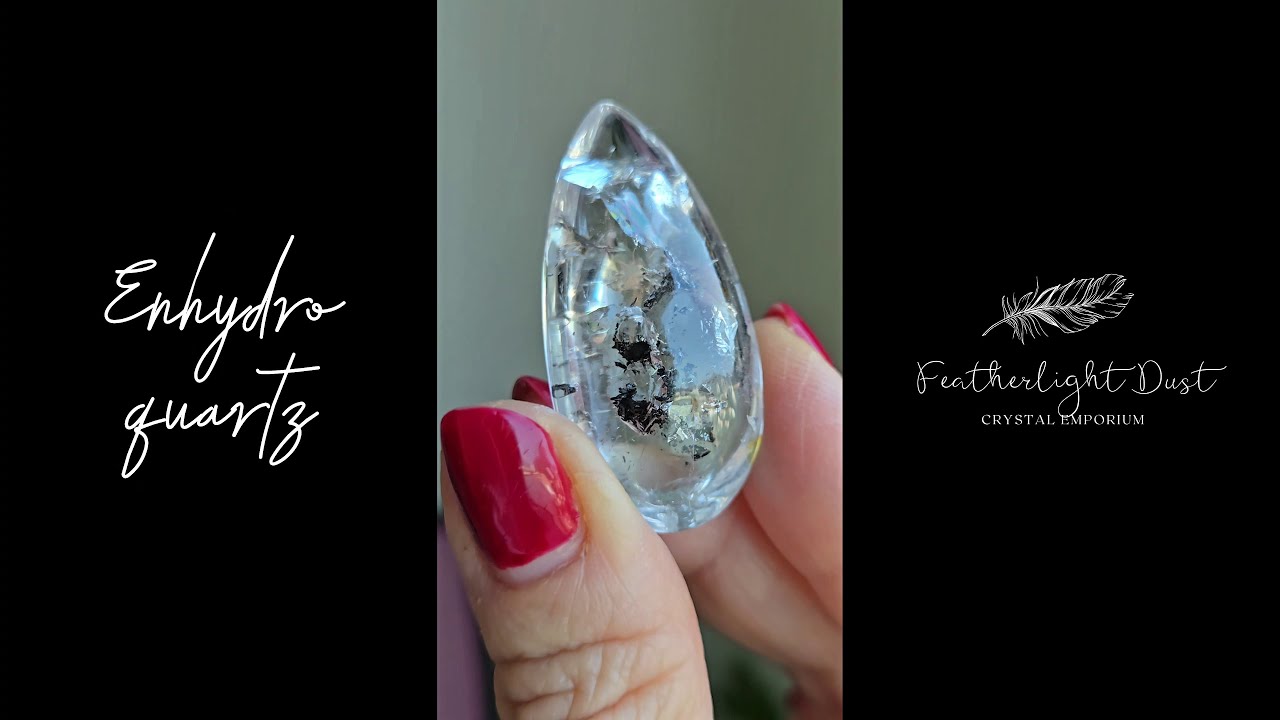 Enhydro cabochon with big bubble and carbon - EN4