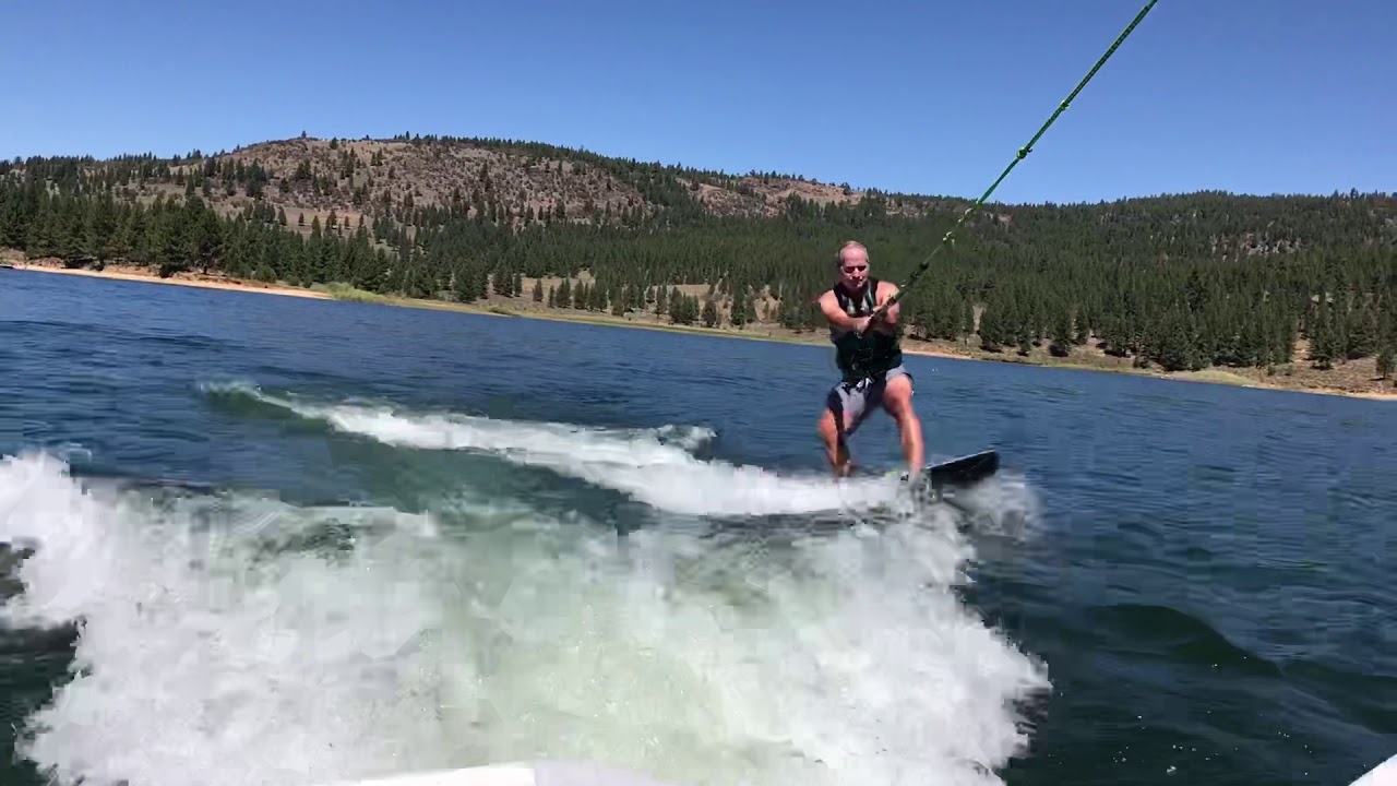 Dad on wake board - YouTube