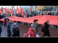 Праздничная демонстрация КПРФ в честь 101-й годовщины Октябрьской революции .