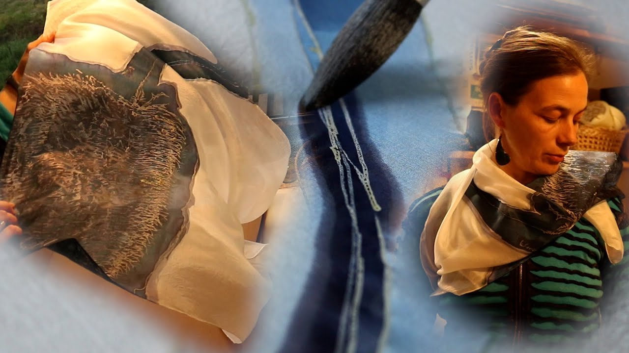 Botanical batik art on silk with dried flower textures transformed into a wearable scarf