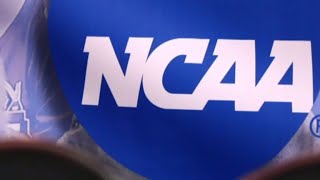 Four NCAA basketball assistant coaches charged in bribery scandal