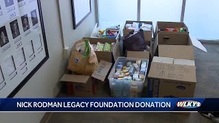 Donation made to Center for Women and Families in honor of fallen LMPD officer