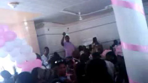 MAMA ESTHER at wedding ceremony