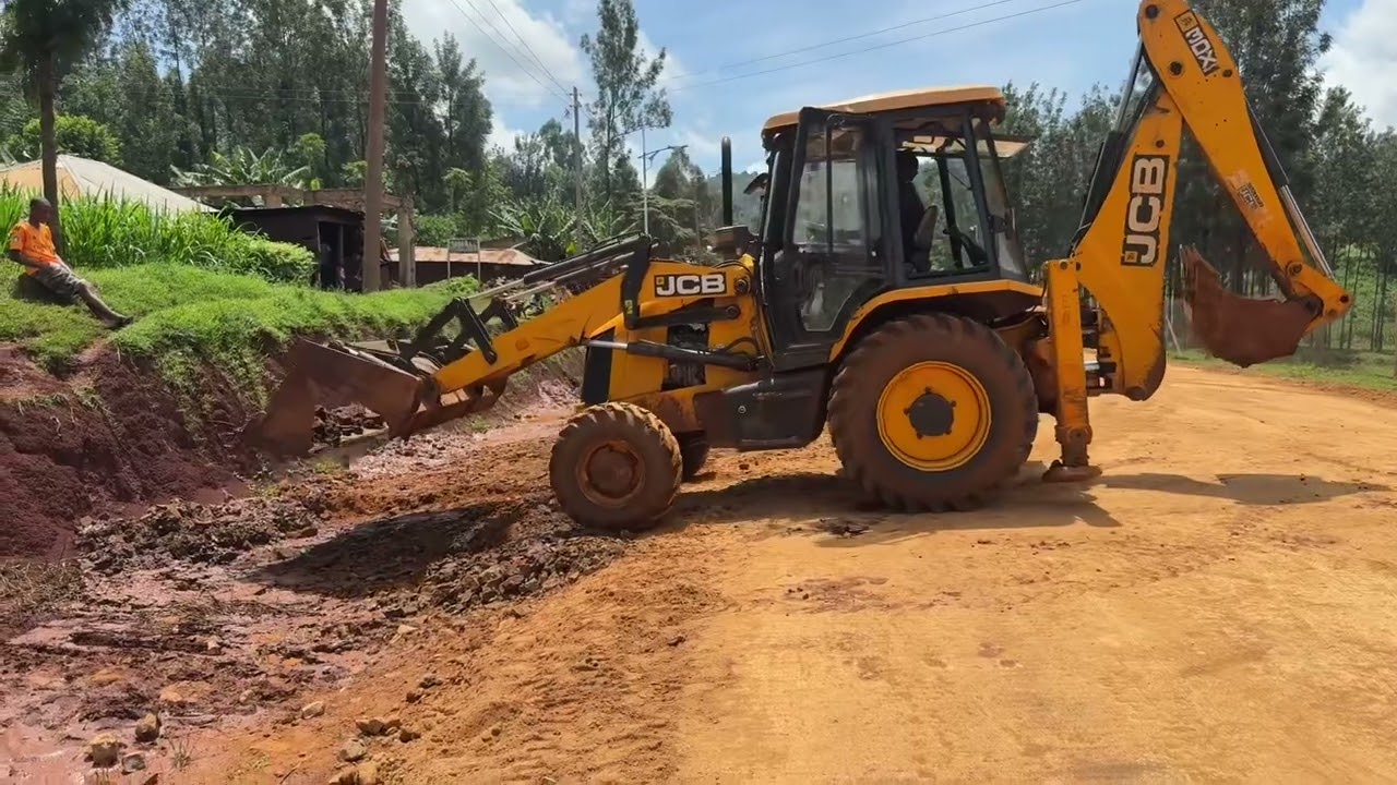 Drainage cleaning with JCB backhoe