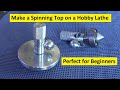 Make a Spinning Toy Top on a Hobby Lathe - a beginner metal lathe project.