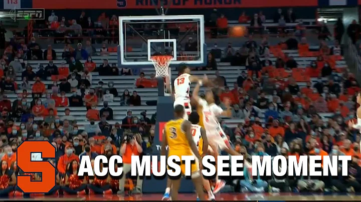 Syracuse's Benny Williams Swats The Ball Out Of Th...