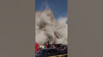 Rescuers work to reach worker trapped in medieval tower that partially collapsed in Rome