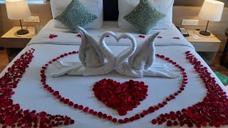 swan towel origami | bride room decoration ideas for first night | anniversary room decoration ideas