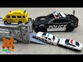 Car carrier takes police car ambulance to a playground slide lets play outside with toy cars