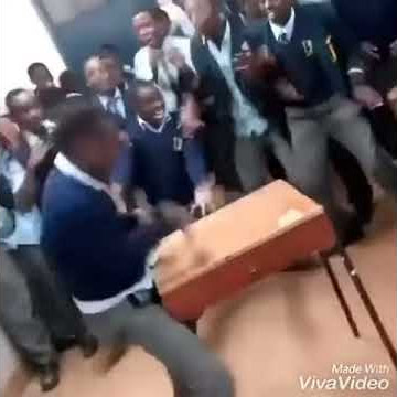Kenyan high school boys dancing in class