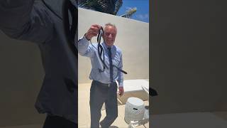RFK Robert Kennedy gets bitten by snakes after he caught them