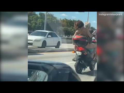 Florida Woman Shaves Her Legs Riding On The Back Of A Motorcycle