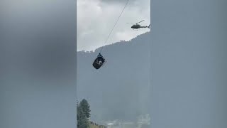 Eight people rescued from stranded cable car in Pakistan