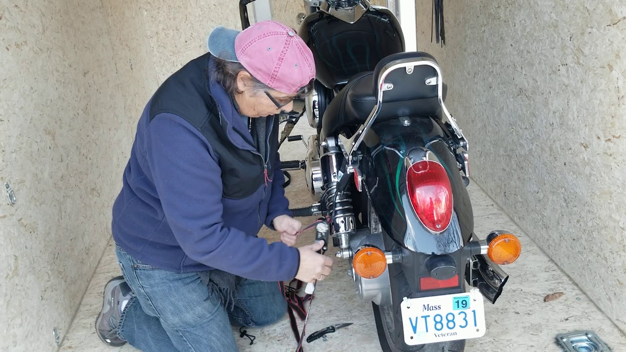 How to Secure a Motorcycle in a Trailer by a Woman YouTube