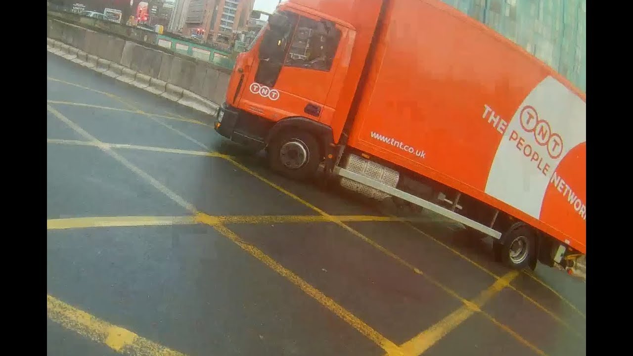 TNT driver jumps red light - YouTube