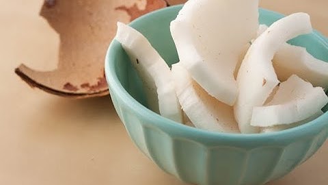 Easiest way to Remove Coconut Flesh From Shell/how to remove the coconut meat from the shell