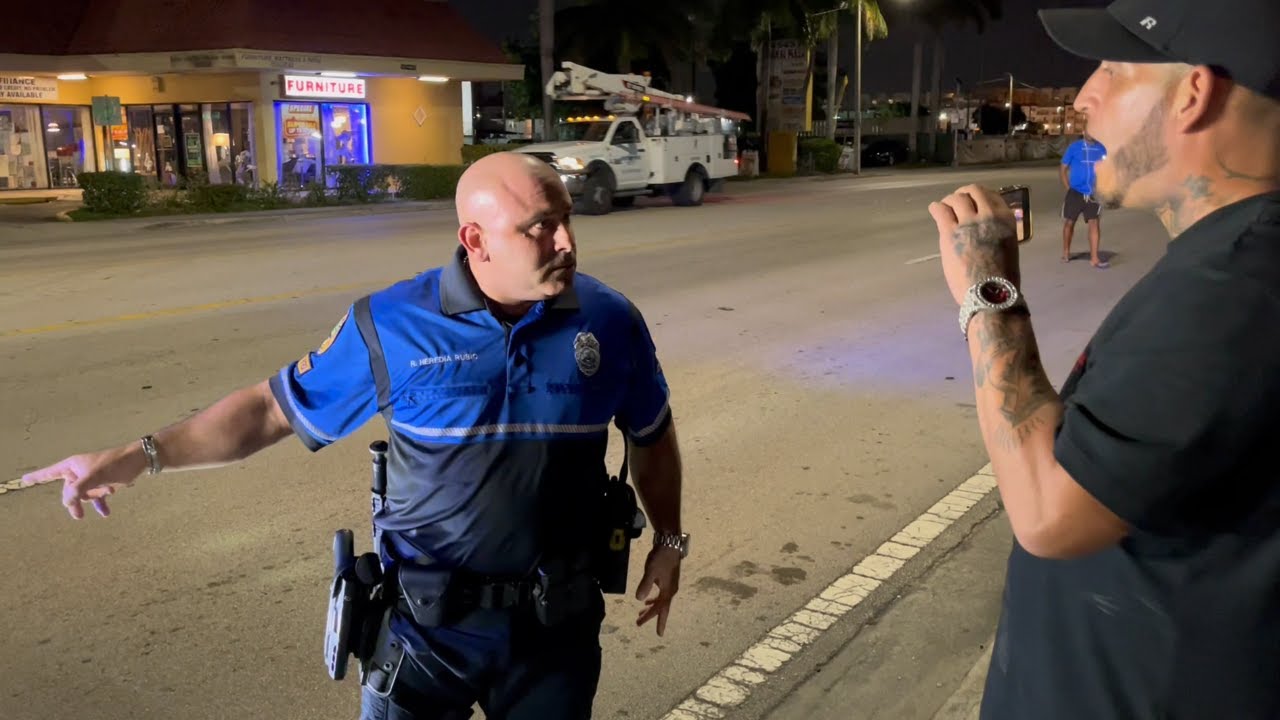 Unhinged Miami Cop Goes Hands On!!!