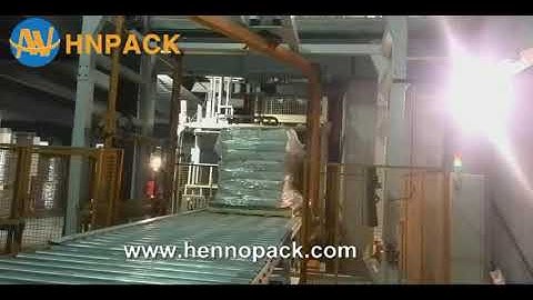 Hennopack in line fully automatic rotary arm pallet stretch wrapper with top foil wrapper