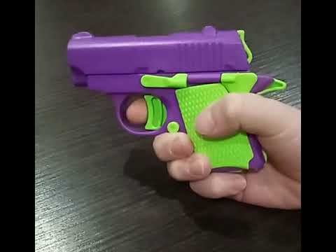 Пистолет игрушечный на 3Д принтере антистресс фиолетово-зеленый новая игрушка, видео 1