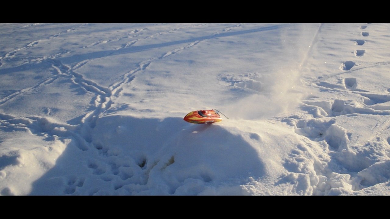 rc boat in snow