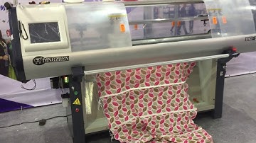 single system computerized flat knitting machine