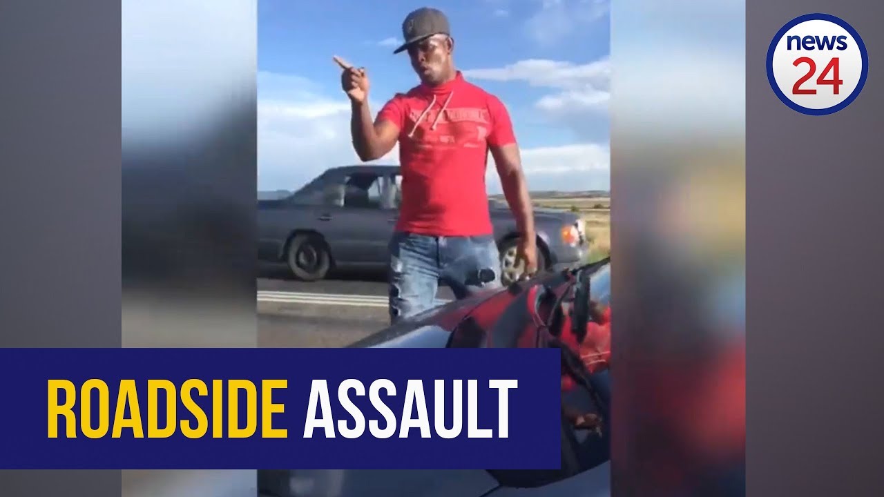 WATCH: Motorist assaults traffic cop during roadside altercation