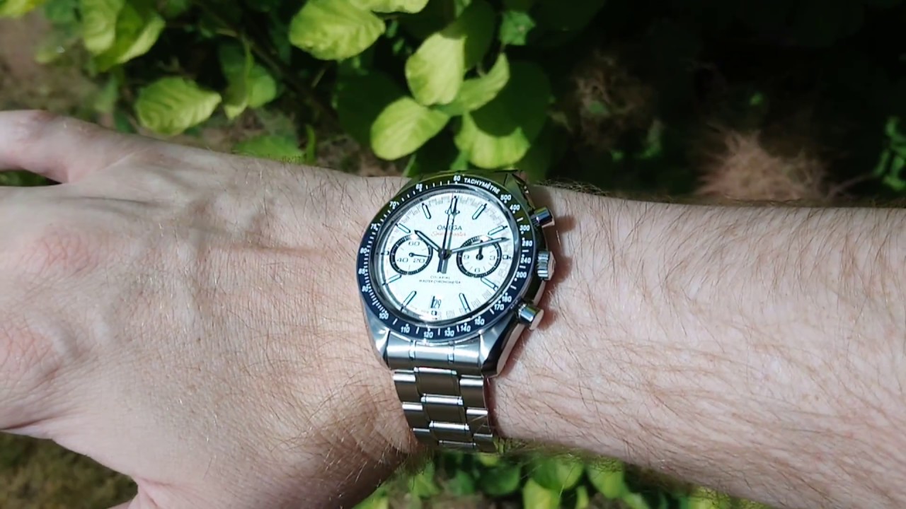 omega speedmaster racing on wrist