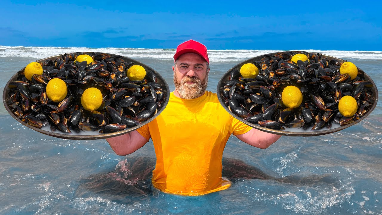 ⁣Culinary Paradise By The Shore! Cooking Mussels Outdoors In A Large Cauldron