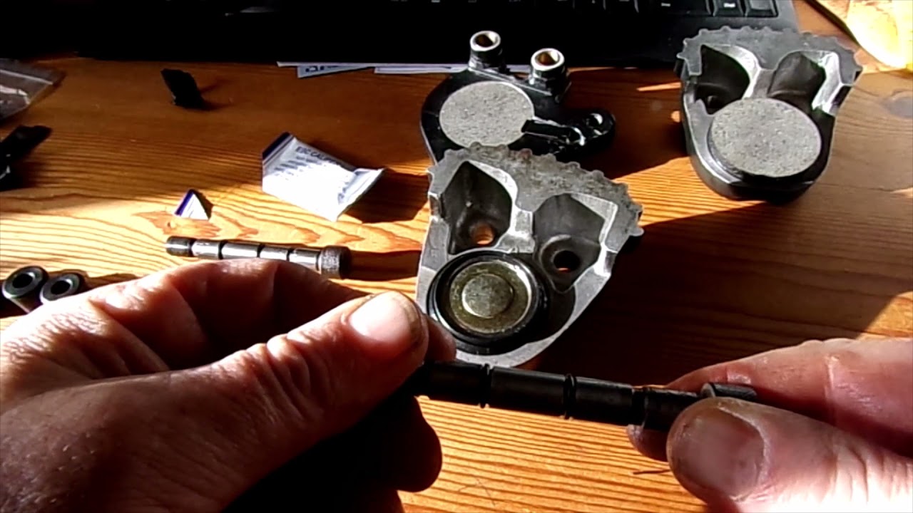 Suzuki GT380 Brake caliper rebuild - YouTube
