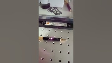 Laser printing on pen