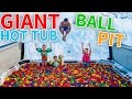 SWIMMING IN A GIANT HOT TUB BALL PIT!
