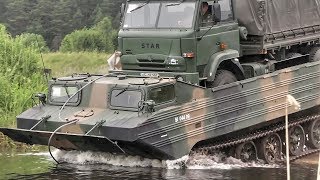 Polish Soldiers Use Soviet Era PTS Amphibious Vehicle To Carrie A Truck Across River