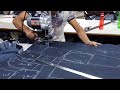 Fabric cutting with straight knife in garment factory