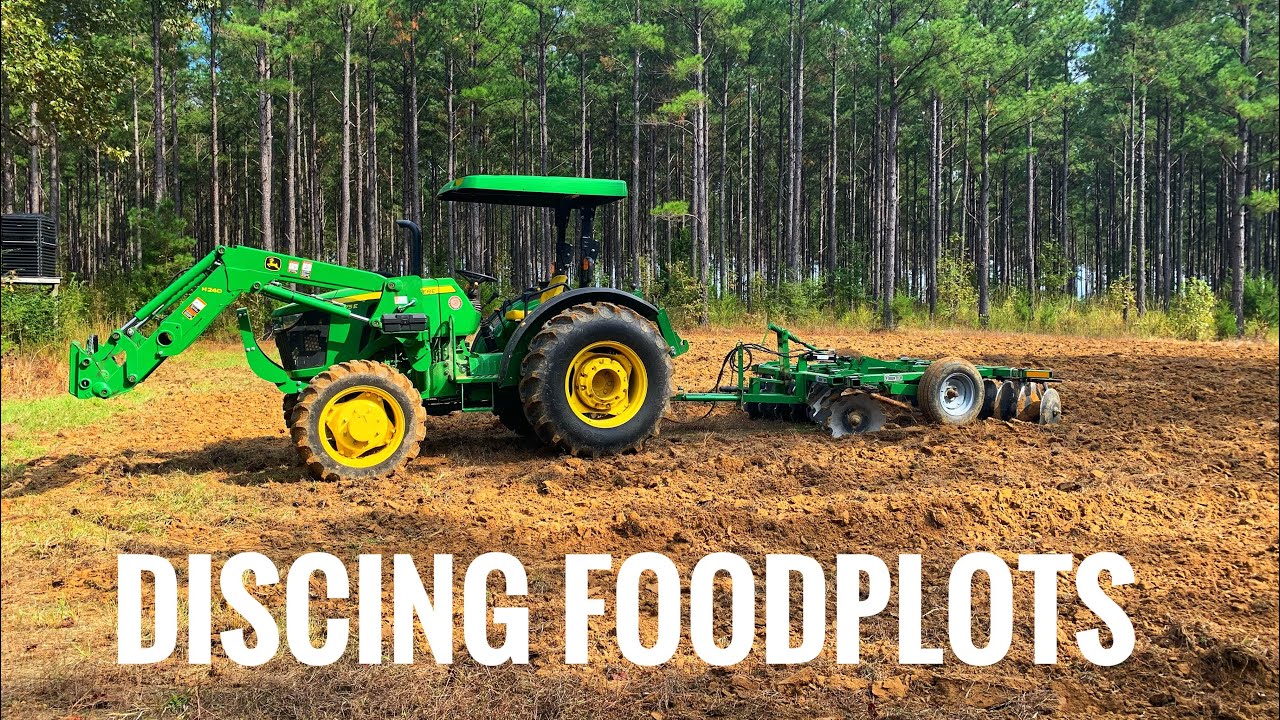 John Deere 5075e discing our food plots in Alabama - YouTube