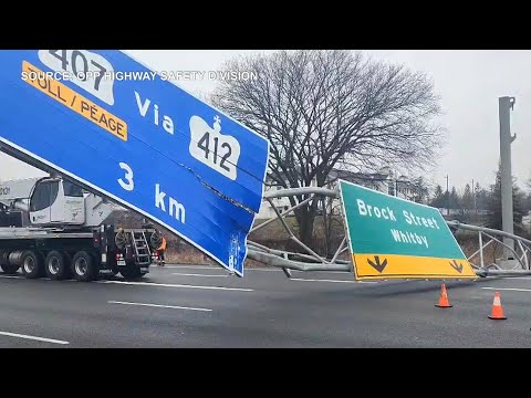 Fallen overhead sign shuts down part of Highway 401 in Whitby, Ontario
