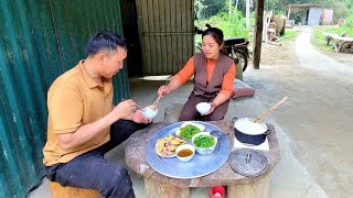 The young couple completed the construction of a sturdy embankment around the pond - happy lunch