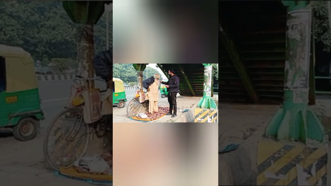 Giving Jacket To Homeless Old Man In Freezing Winter