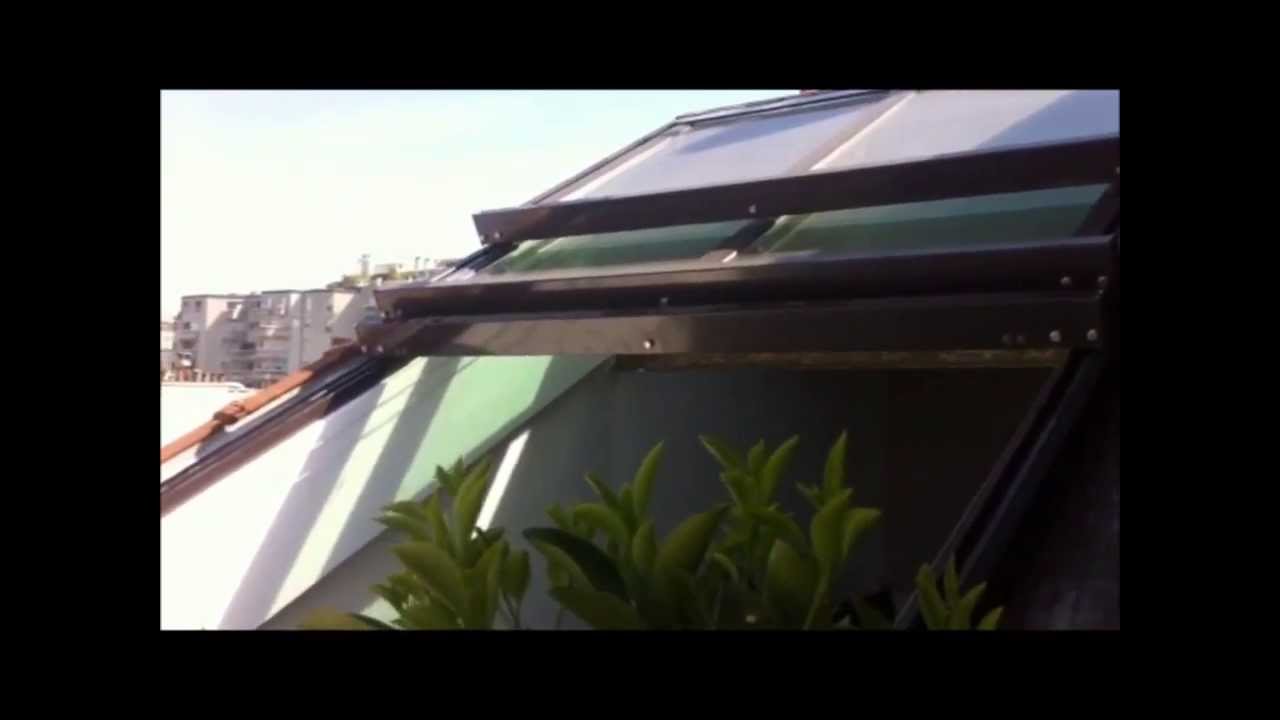 toiture ouvrante avec vue sur les toits de Paris