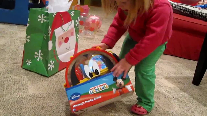 Mary Milam opening up her first Christmas gift!!