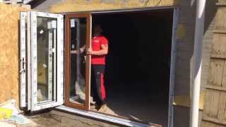 Mpn windows fitting a NEW WAVE DOOR in Neath.