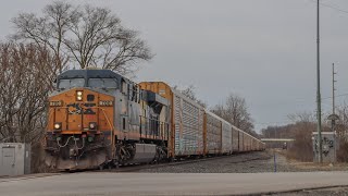 Catching CSX M224 flying through barberton with a Auto rack train.￼￼