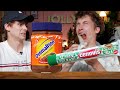 British guys review Swiss chocolate snacks