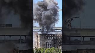 Detonation to bring down the water tower atop the Centennial Mills building.