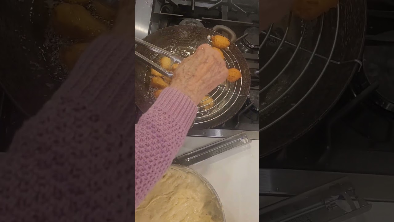 Making New Years Cookies with powdered suger coating!